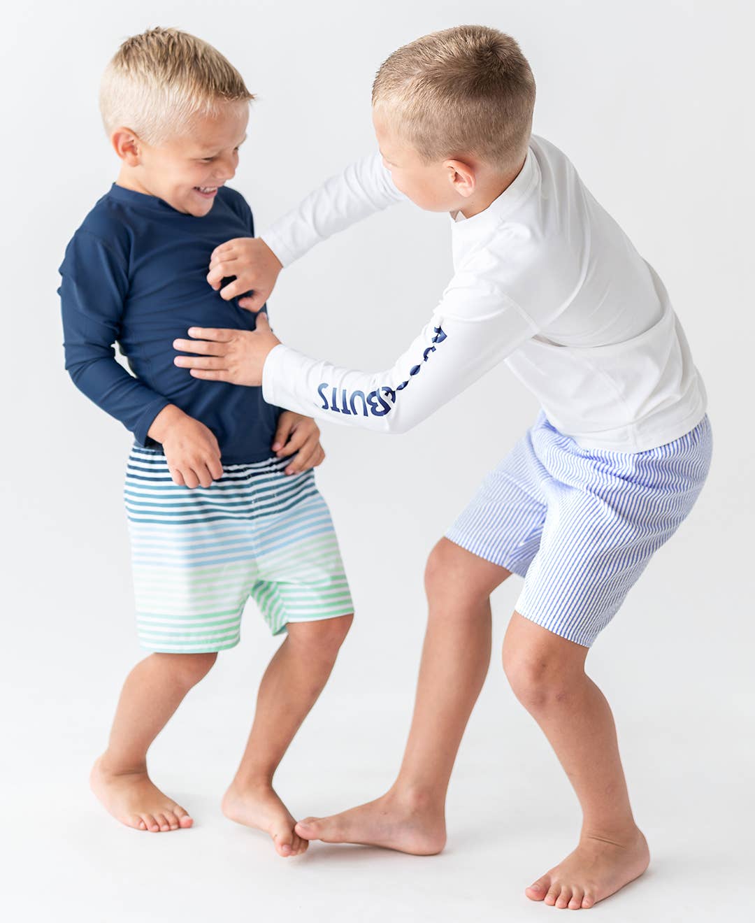 RuffleButts + RuggedButts - Boys Navy Long Sleeve Rash Guard